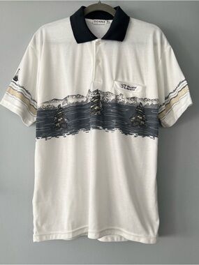 Donna White Polo with Navy Collar and Nautical Ship Graphic and St. Martin Logo